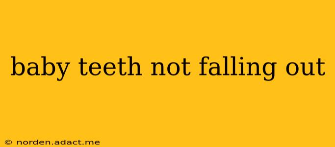 baby teeth not falling out