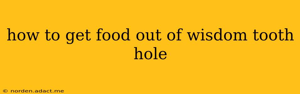 how to get food out of wisdom tooth hole