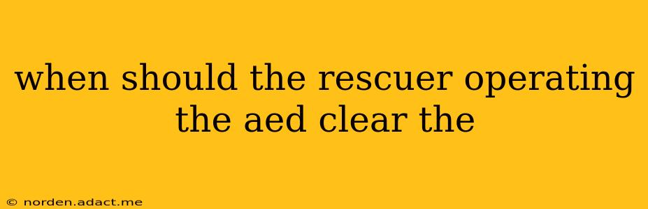 when should the rescuer operating the aed clear the