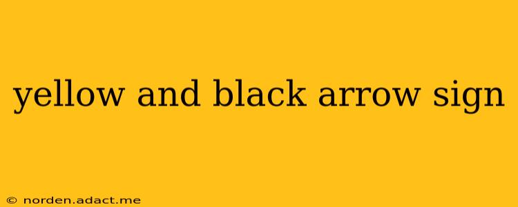 yellow and black arrow sign
